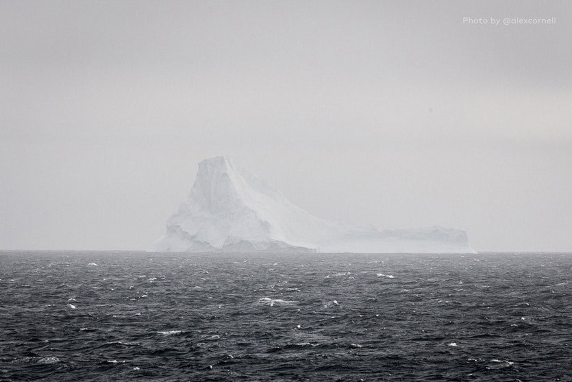 A flipped iceberg shows its true colours